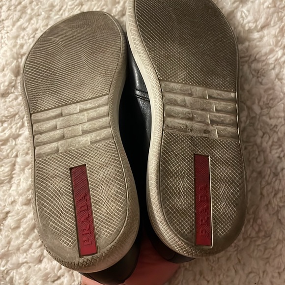 Prada loafers black white bottoms with res prada stripe